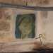Un piccolo affresco, in evidente stato di degrado, sulle mura di una casa di Bari Vecchia
